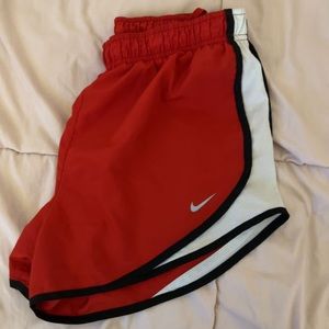 red nike shorts